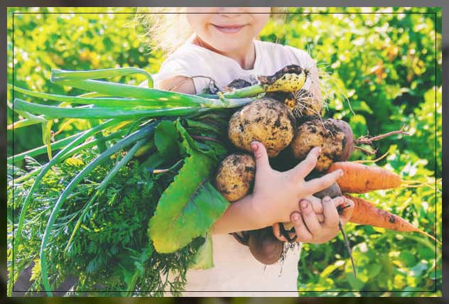 girl growing fruits and vegetables 