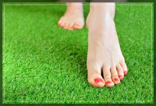 finishing touches to artificial grass